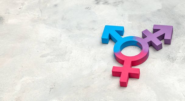 Transsukupuolinen symboli ja sukupuoli symboli miehen ja naisen harmaalla pohjalla - Valokuva, kuva
