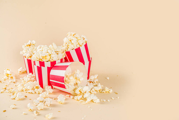 Tasty pop corn in small paper glasses, copy space - Photo, Image