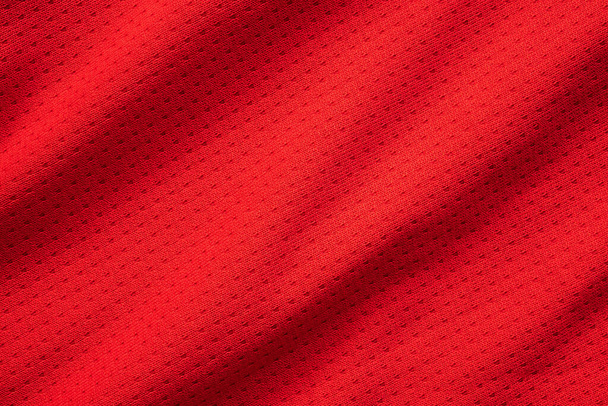 Rode sport kleding stof voetbal shirt jersey textuur close up - Foto, afbeelding