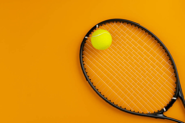 Tennis player sport equipment. Tennis racket and ball - 写真・画像