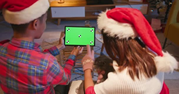 couple use tablet during Xmas - Footage, Video