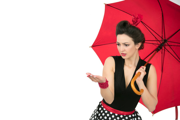 Retro girl with red umbrella look weather. - Foto, imagen