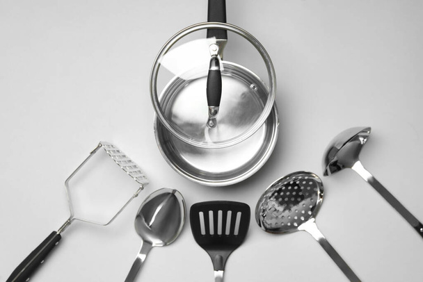 Set of modern cooking utensils on light grey background, flat lay - Photo, Image