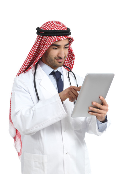 Arab saudi emirates doctor man browsing a digital tablet - Фото, изображение