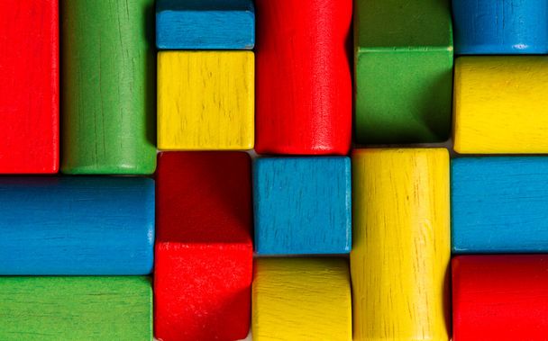 Toys blocks, multicolor wooden bricks, group of colorful building game pieces - Fotografie, Obrázek