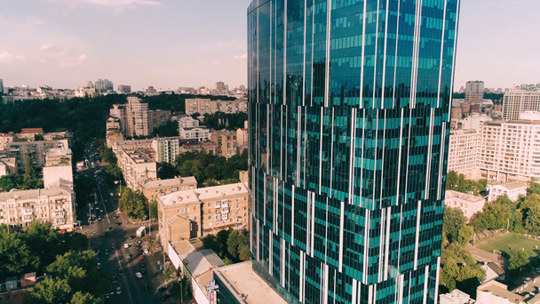 Aerial view of modern skyscraper in city - Footage, Video
