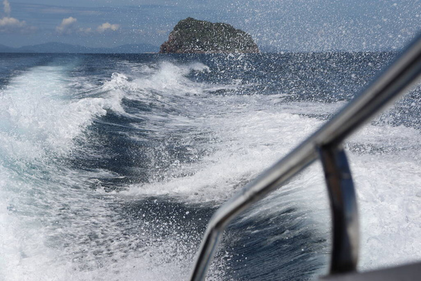 background waves and splashes, speedboat ride near tropical islands in ocean in asia - Photo, Image