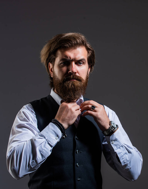 Man serious bearded businessman stylish formal outfit, adjust necktie concept - 写真・画像