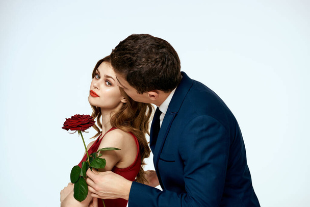 cute man and woman dating relationship red rose lifestyle romance - Foto, imagen