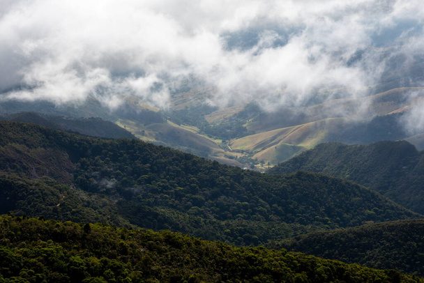 Beautiful view of green rainforest mountains under clouds near Rio de Janeiro, Brazil - Valokuva, kuva