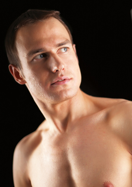 Portrait of a naked muscular man - Foto, Imagen