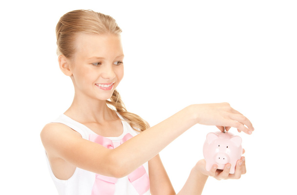 Lovely teenage girl with piggy bank and money - Foto, Imagem
