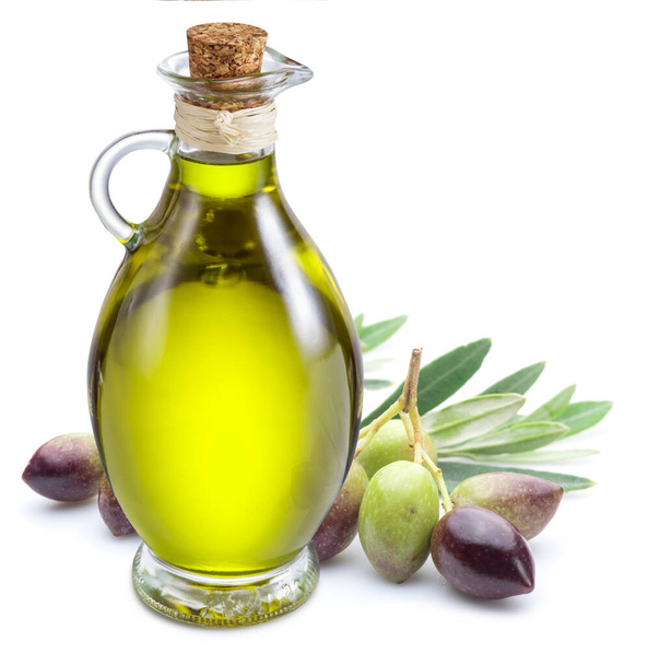 Ripe natural olives with bottle of olive oil isolated on a white background.  - Фото, изображение