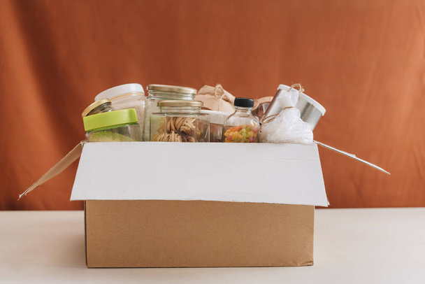 Cardboard box with food, food donation, home delivery, horizontal, copy space. - Fotografie, Obrázek