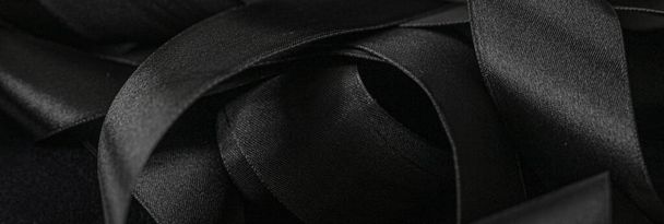 Black silk ribbon as background, abstract and luxury brand design - Photo, Image