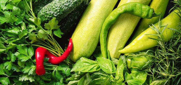 Fresh organic green vegetables background. Banner. Vegan food concept. Top view - Photo, Image