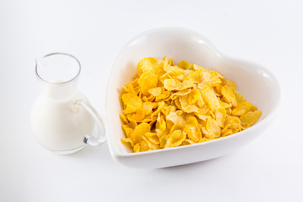 A bowl of nutritious and delicious corn flake cereal with milk - Photo, Image