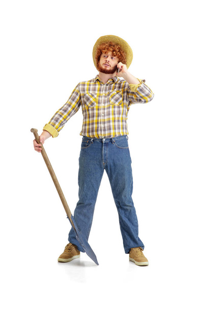 Handsome farmer, rancher isolated over white studio background - Zdjęcie, obraz