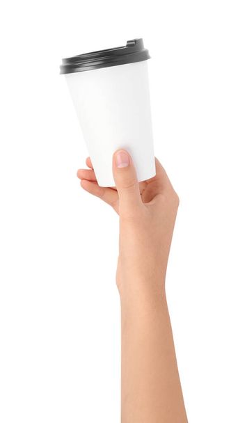 Woman holding takeaway paper coffee cup on white background, closeup - Foto, afbeelding