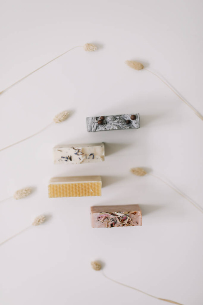 Homemade natural soap bars. Spa concept, natural cosmetics. Flat lay, top view. - Φωτογραφία, εικόνα