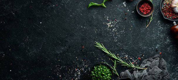 Black stone culinary banner. Top view. Rustic style. - 写真・画像