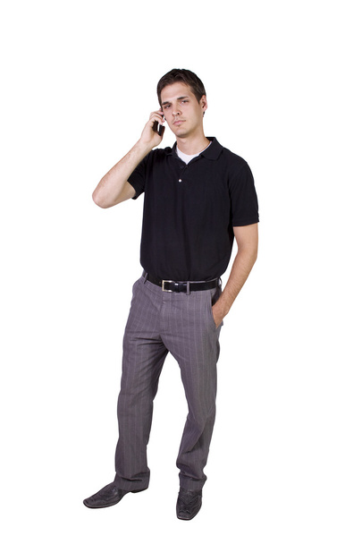 Young businessman conversing on cell phone - Zdjęcie, obraz