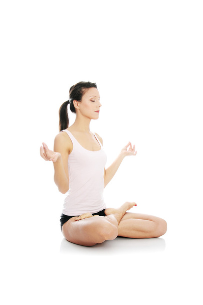 Young woman exercising yoga - Foto, Imagem