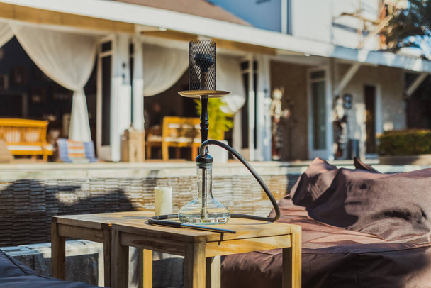 Shisha bar with a sitting bag. Lounge place. hookah in interior. summer time. - Photo, Image