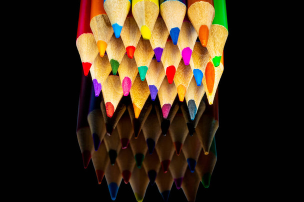 Colorful pencils isolated on black background.Close up. Macro shot - Foto, Imagem