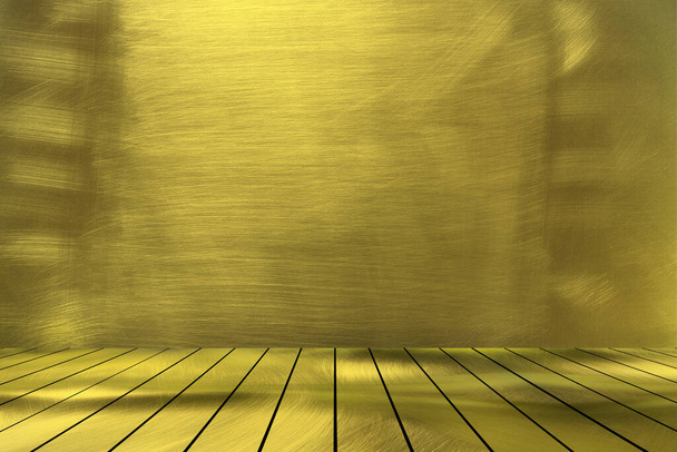 top gouden metalen bureau met goud stalen muur achtergrond - Foto, afbeelding