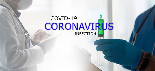 A scientist is holding a coronavirus vaccine in his hand. - Valokuva, kuva