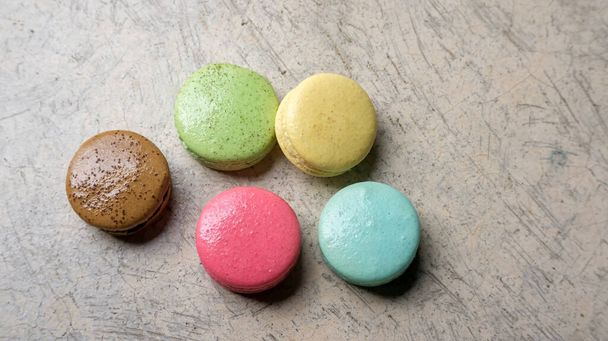 Colorful macaroons on gray background. - Photo, Image