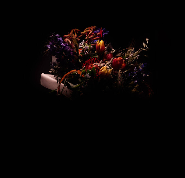 flowers isolated on black background. Floral arrangement, bouquet of garden flowers.  - Фото, зображення