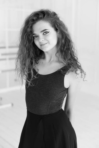 Girl ballerina with curly hair. Black and white photo. BW - Foto, immagini