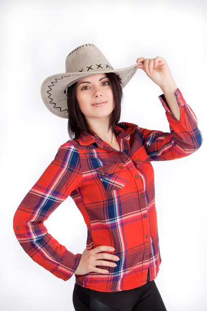Girl cowboy hat and plaid shirt, cute smiling - Foto, afbeelding