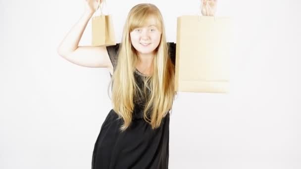 Portrait of a girl with white hair with packages. Sales. Black Friday.  - Footage, Video