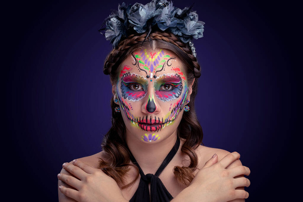Catrina with black dress and colored background - Photo, Image