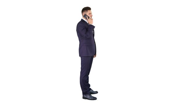 Businessman talking on the phone on white background. - Foto, imagen