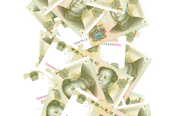 1 купюри китайських юаней летять вниз ізольовано на білому. Багато банкнот падають з білим копіювальним простором зліва і справа. - Фото, зображення