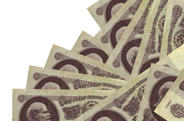 25 російських рублів лежать в іншому порядку, ізольованому на білому. Місцеві банки або створення грошей. Прапор для бізнесу - Фото, зображення