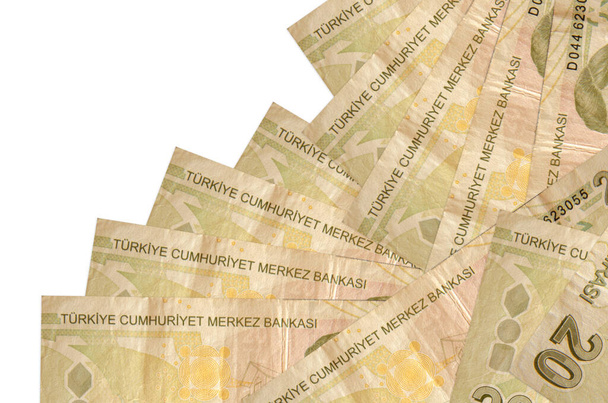 20 türkische Lira-Scheine liegen in unterschiedlicher Reihenfolge isoliert auf weiß. Local banking oder money making concept. Banner mit geschäftlichem Hintergrund - Foto, Bild