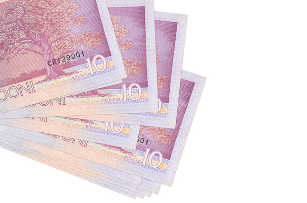 10 Estonian kroon bills lies in small bunch or pack isolated on white. Mockup with copy space. Business and currency exchange concept - Photo, Image