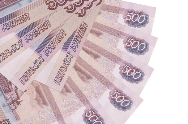 500 rubeles rubel bankjegyek elszigetelt fehér háttér másolási hely egymásra ventilátor alakban közeli. Pénzügyi tranzakciók fogalma - Fotó, kép