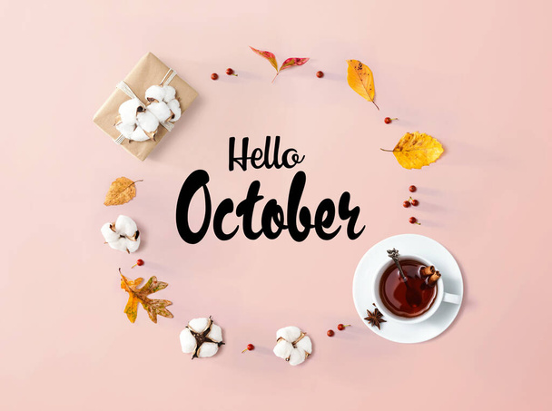 Hello October message with autumn leaves and tea - Foto, immagini