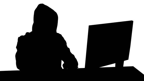 Silhouette Experienced hacker answers someones call. - Фото, изображение