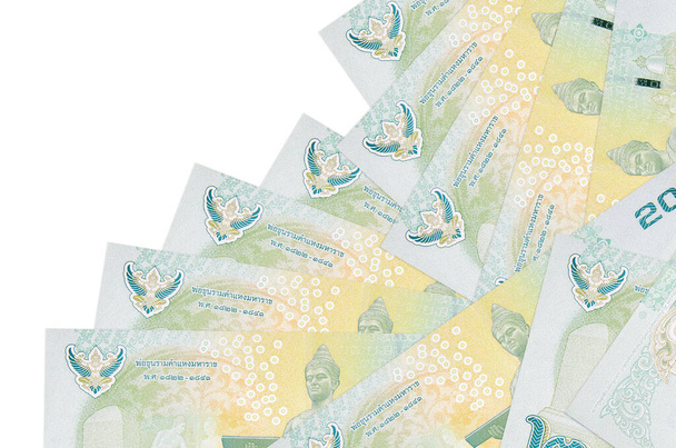 20 thajských baht bankovek leží v jiném pořadí izolované na bílém. Místní bankovní nebo peněžní koncept. Nápis - obchodní pozadí - Fotografie, Obrázek
