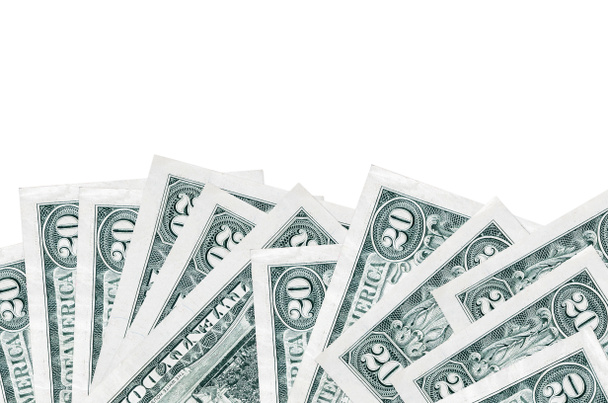 20 USA dollár bankjegyek fekszik az alsó oldalon a képernyő elszigetelt fehér háttér fénymásolási hely. Háttér banner sablon üzleti koncepciók pénzzel - Fotó, kép