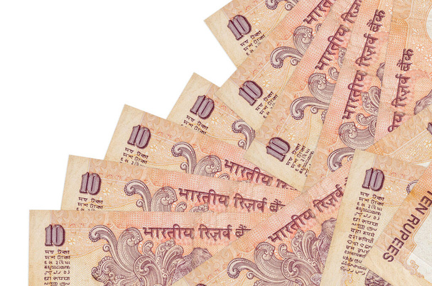 10 notas de rúpias indianas encontra-se em ordem diferente isolado em branco. Banco local ou conceito de ganhar dinheiro. Banner de fundo de negócios - Foto, Imagem