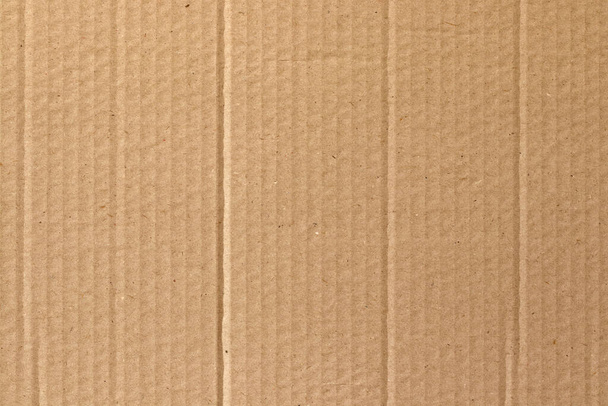Fondo abstracto de la hoja de cartón marrón, textura de la caja de papel reciclado en viejo patrón vintage para la obra de arte de diseño. - Foto, imagen