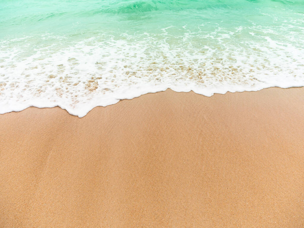 Soft wave sea on sand beach for background summer travel holidays. - Photo, Image